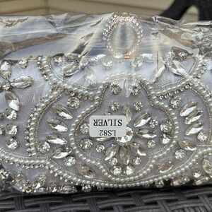 Elegant Silver Clutch with Crystal Embellishments